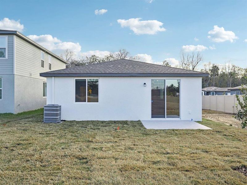 Exterior details and patio area of a home in Leyland Preserve - Premier Series, Brooksville (Image 20).