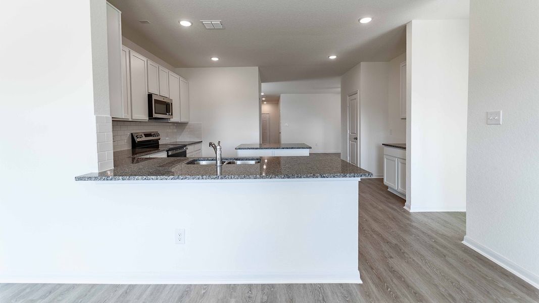 Furnished interior view inside a new home in Katzer Ranch, Converse (Image 4).