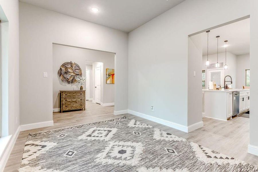 Empty room featuring light hardwood / wood-style flooring