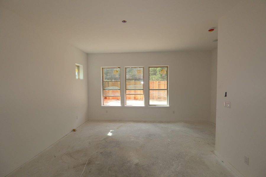 In-progress construction of a new home in Escondido 60' Homesites, Magnolia, TX (Image 4).