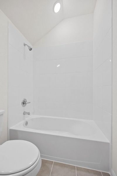 Bathroom in the Elm home plan by Trophy Signature Homes – REPRESENTATIVE PHOTO