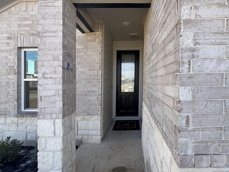 Exterior details and patio area of a home in The Summit at Saddlebrook Ranch 55's, Schertz (Image 27).
