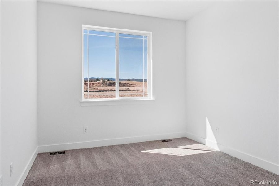 Spacious, unfurnished interior of a new home in Peakview at Ascent Village, Littleton (Image 21).