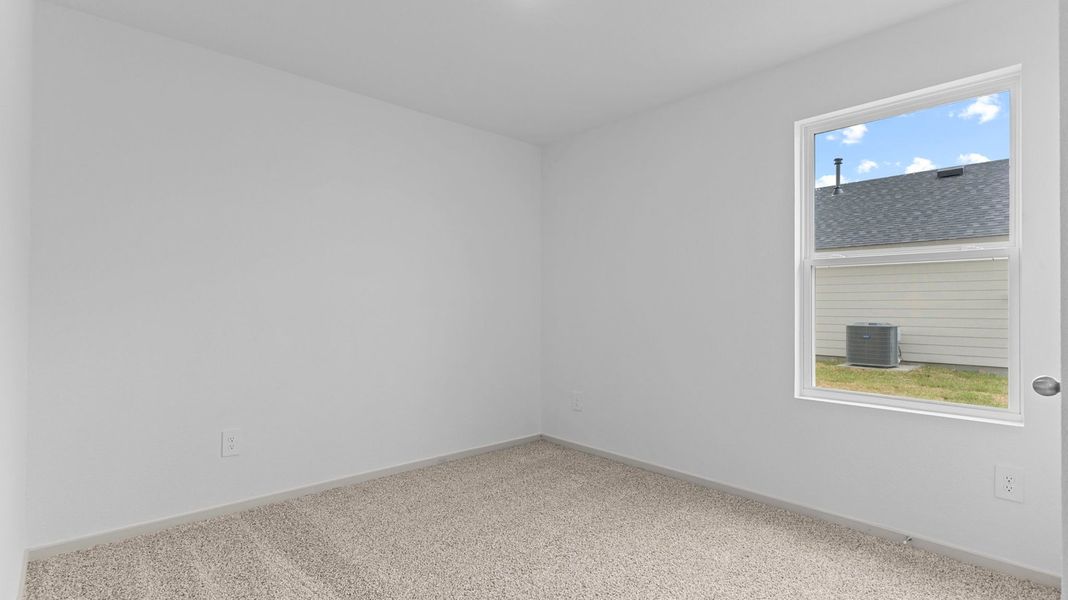 Spacious, unfurnished interior of a new home in Watermark, Alvin (Image 13).