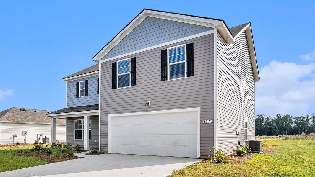 Front exterior of a new home in Eden Springs, Longs, SC, highlighting curb appeal (Image 19).