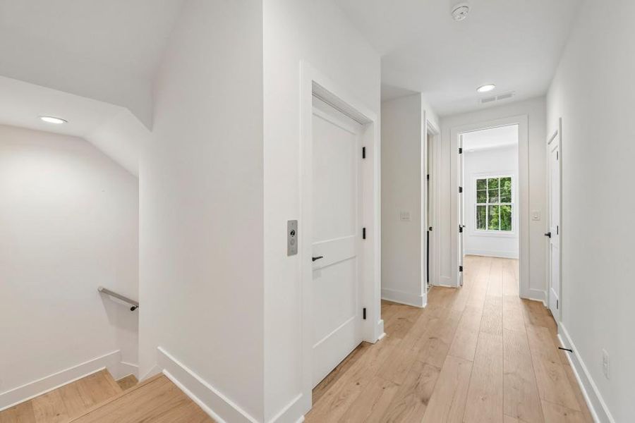 Spacious, unfurnished interior of a new home in Skyview On Broad, Sugar Hill (Image 21). Spacious, unfurnished interior of a new home in Skyview On Broad, Sugar Hill (Image 21).