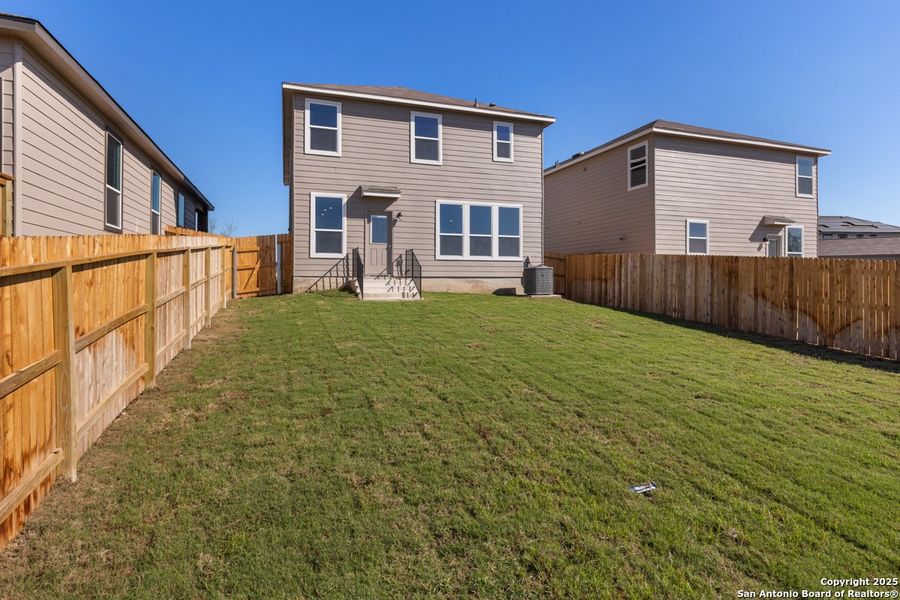 Exterior details and patio area of a home in Knox Ridge, Converse (Image 3).