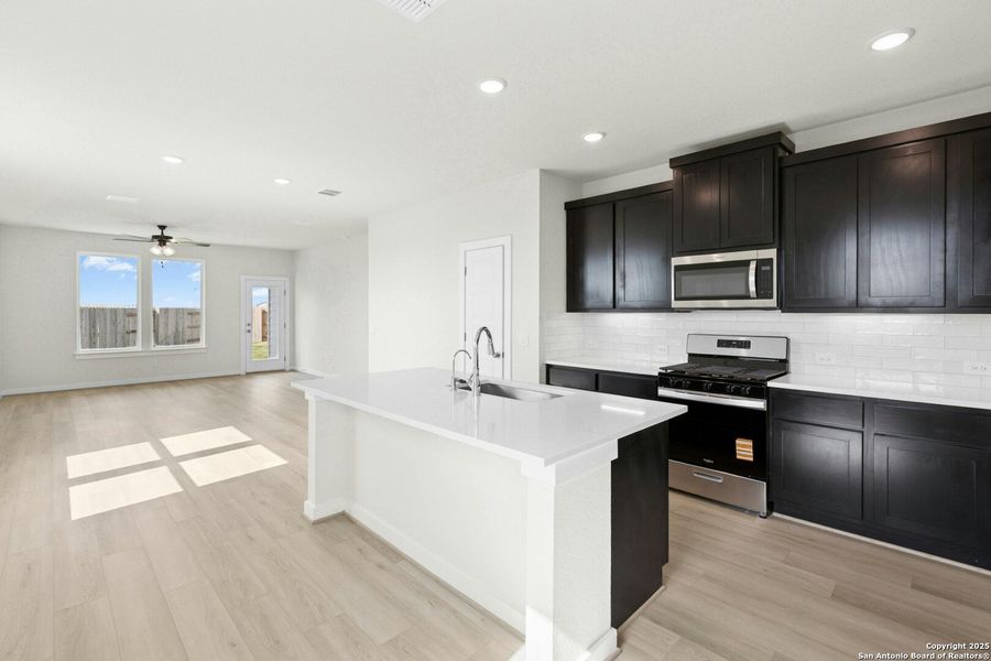 Furnished interior view inside a new home in Willowbrook, New Braunfels (Image 6). Furnished interior view inside a new home in Willowbrook, New Braunfels (Image 6).