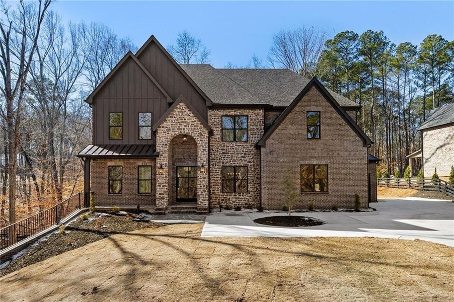 Front exterior of a new home in , Lawrenceville, GA, highlighting curb appeal (Image 24).