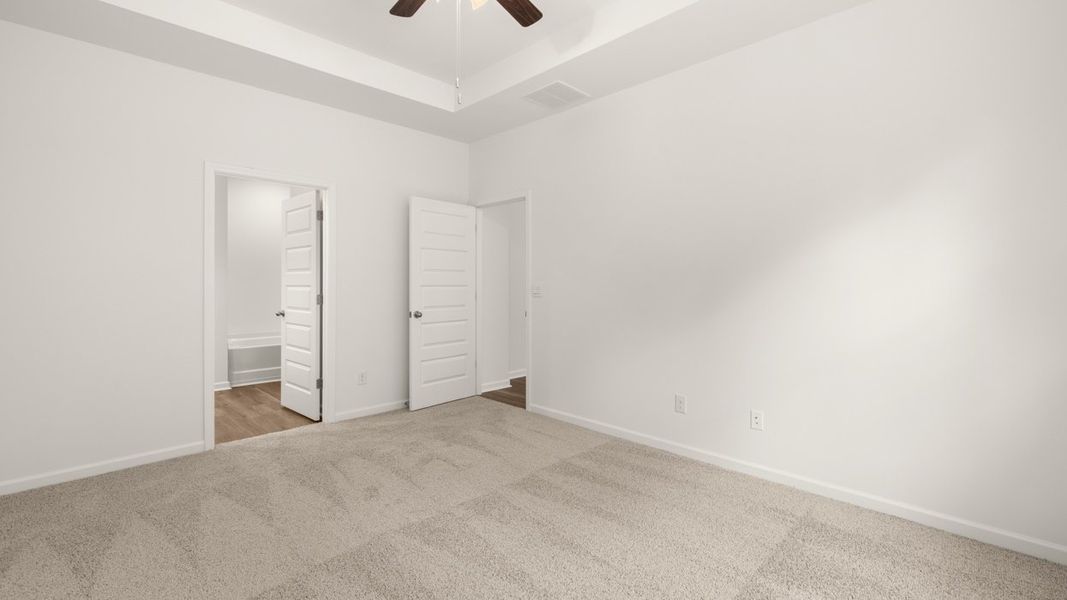 Representative unfurnished interior of a home built from the Cali by D.R. Horton in The Reserve at Calcutta, Stockbridge (Image 17).