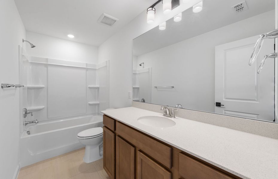 Representative furnished interior of a home built from the Mabel II with ADU by Pulte Homes in SeaFlower, Bradenton (Image 16).