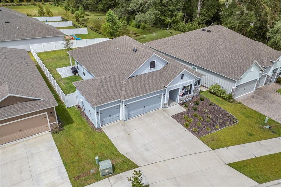 Front exterior of a new home in , Newberry, FL, highlighting curb appeal (Image 28).