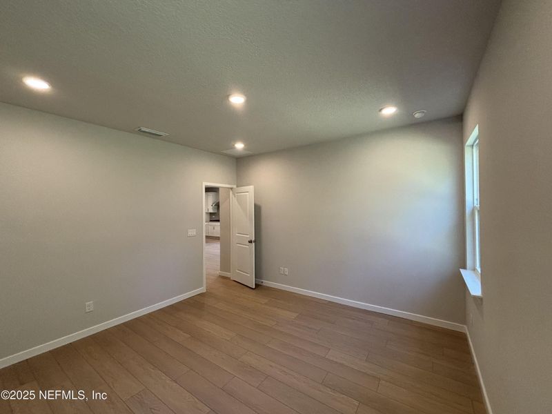 Spacious, unfurnished interior of a new home in The Magnolia Series at Reserve East, Flagler Beach (Image 25).