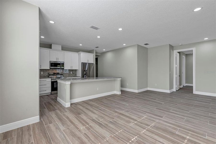 Furnished interior view inside a new home in , Summerfield (Image 16).