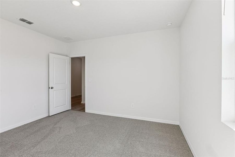 Spacious, unfurnished interior of a new home in Leyland Preserve - Classic Series, Brooksville (Image 17).