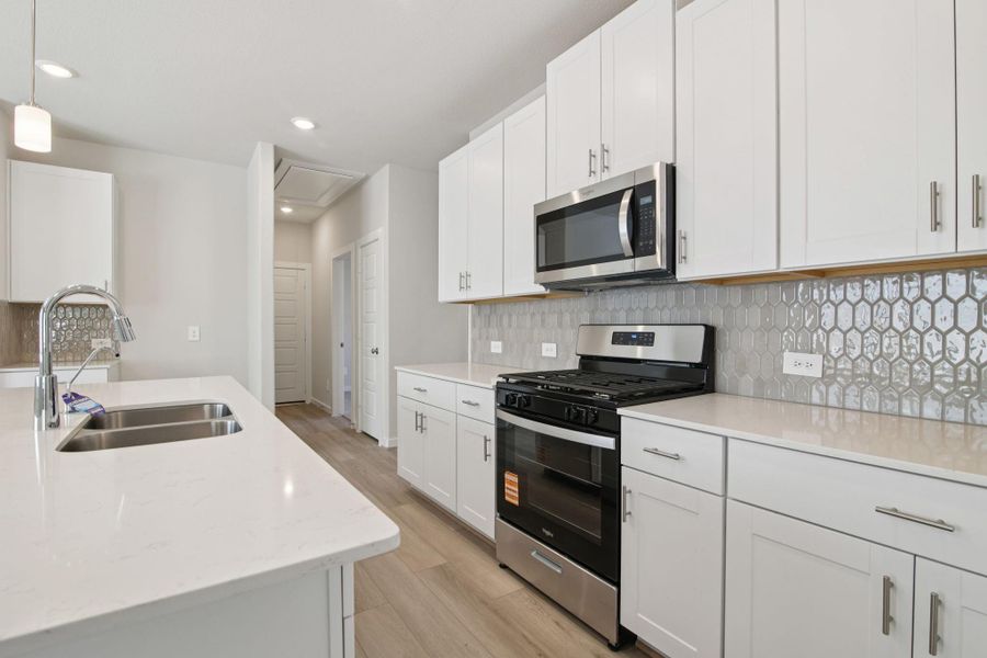 Furnished interior view inside a new home in Landing Meadows - Traditional Series, New Caney (Image 8). Furnished interior view inside a new home in Landing Meadows - Traditional Series, New Caney (Image 8).