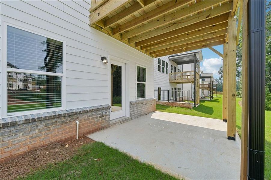 Exterior details and patio area of a home in Martin Springs - Estate Series, Lawrenceville (Image 27).