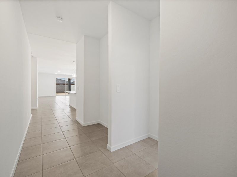 Spacious, unfurnished interior of a new home in Entrada Estate Series, Tolleson (Image 13).