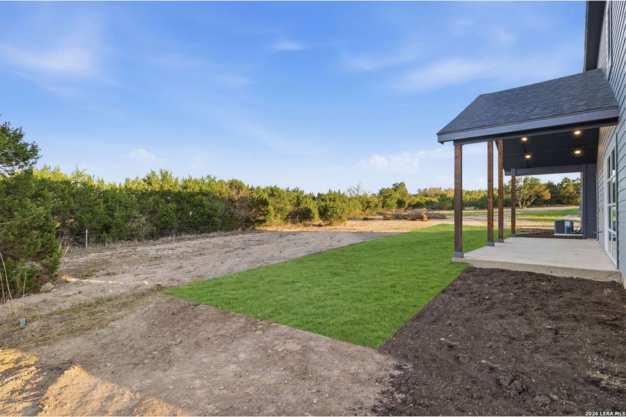 Exterior details and patio area of a home in , Fischer (Image 3).