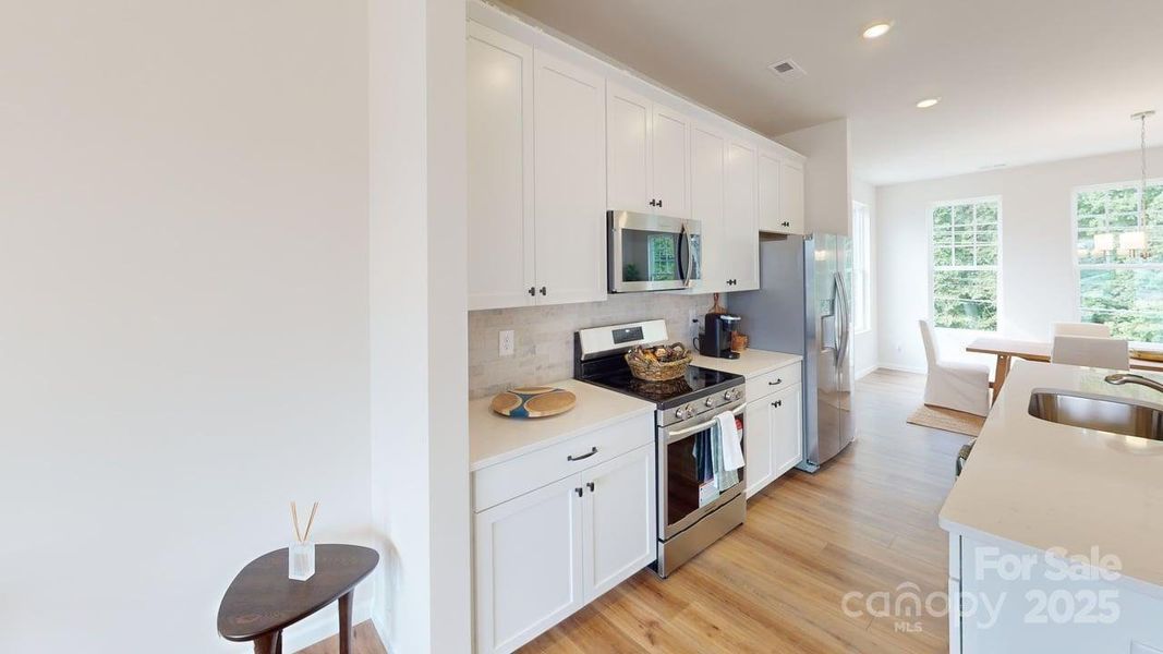 Furnished interior view inside a new home in Vanguard at Vermillion, Huntersville (Image 7).