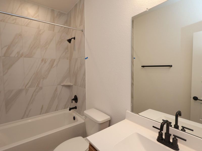 Furnished interior view inside a new home in Sorella, Tomball (Image 12).