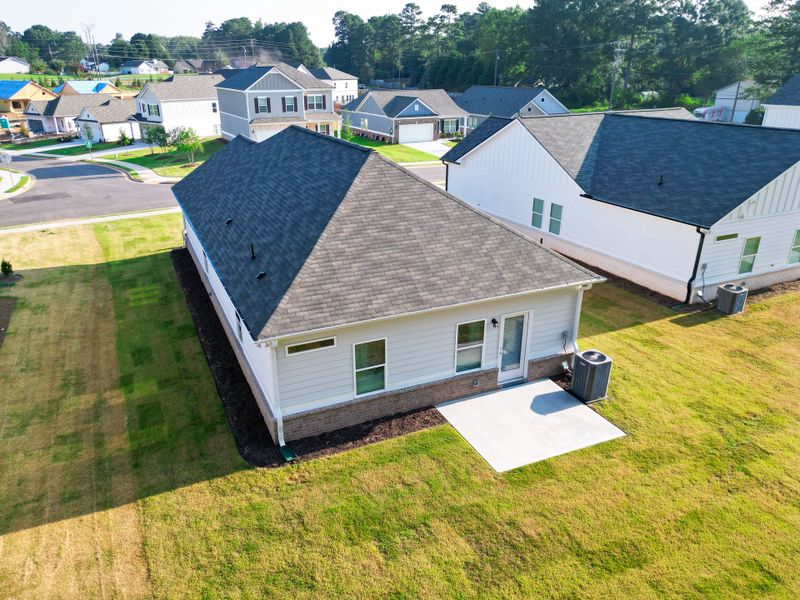 Front exterior of a new home in Trellis Park, Hampton, GA, highlighting curb appeal (Image 18).
