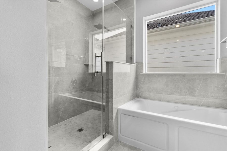 Separate shower and jetted tub Separate shower and jetted tub