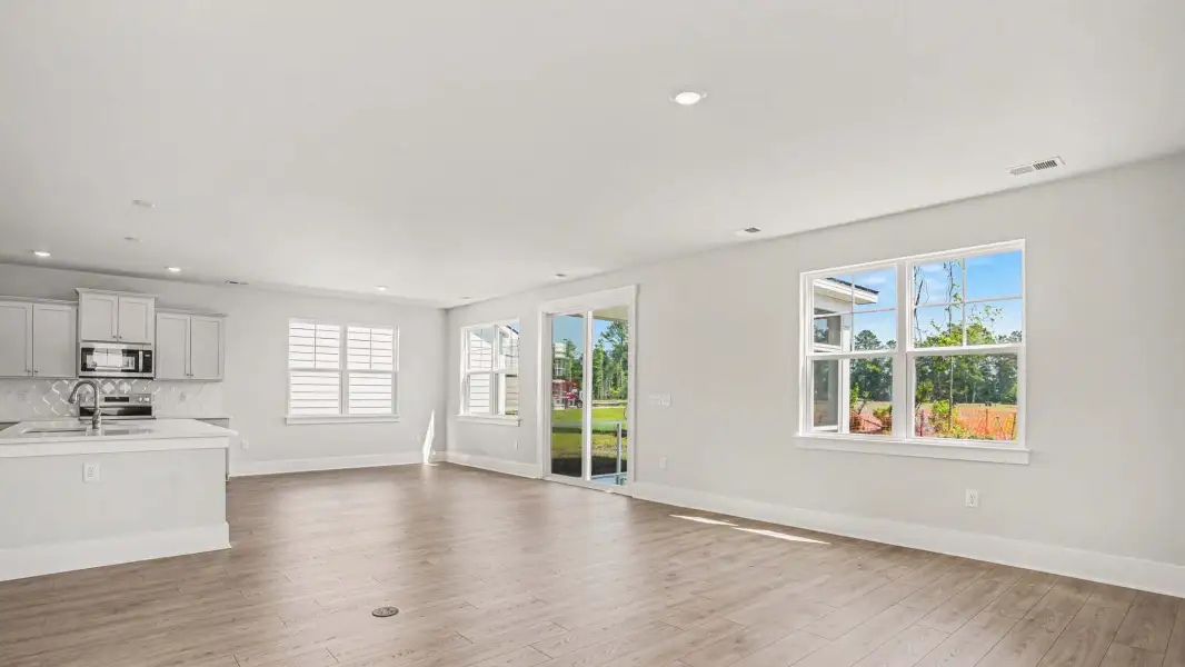 Representative unfurnished interior of a home built from the Mackenzie2 by D.R. Horton in Riverlake, Supply (Image 7).