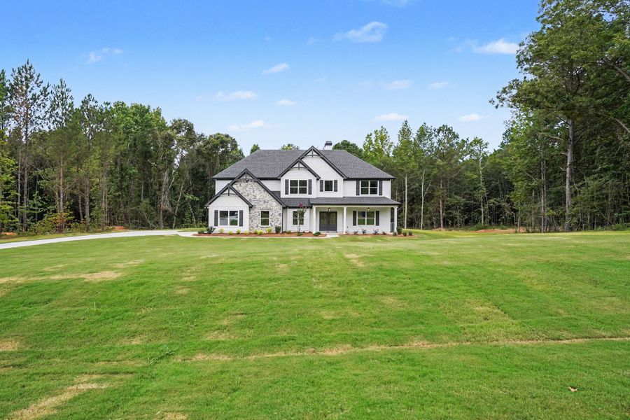 Front exterior of a new home in Flint Farms, Concord, GA, highlighting curb appeal (Image 26).