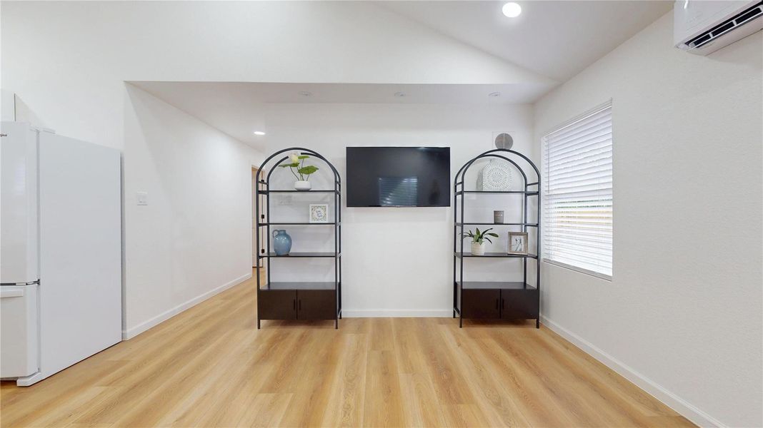 Living room with 3 color changing spotlights above