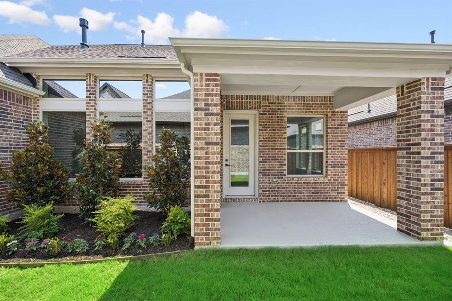 Front exterior of a new home in Elements at Viridian - Garden Series, Arlington, TX, highlighting curb appeal (Image 2). Front exterior of a new home in Elements at Viridian - Garden Series, Arlington, TX, highlighting curb appeal (Image 2).