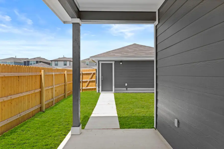Exterior details and patio area of a home in Valverde, Bastrop (Image 3).
