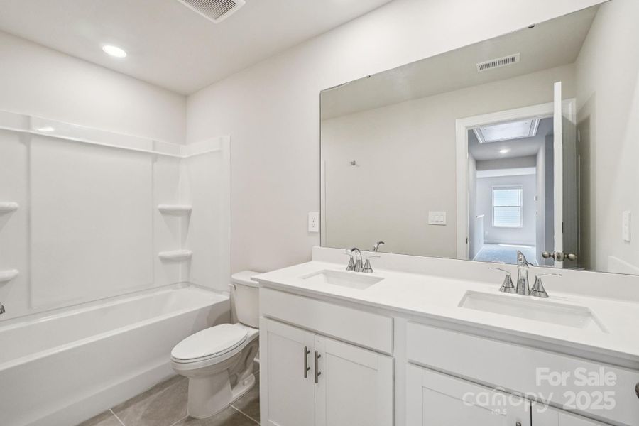 Photo is not of the actual home, but is an inspirational photo of builder’s model home and may depict options, furnishings, and/or decorator features that are not included