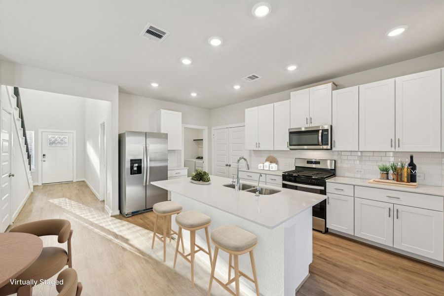 Furnished interior view inside a new home in Landing Meadows - Traditional Series, New Caney (Image 13). Furnished interior view inside a new home in Landing Meadows - Traditional Series, New Caney (Image 13).