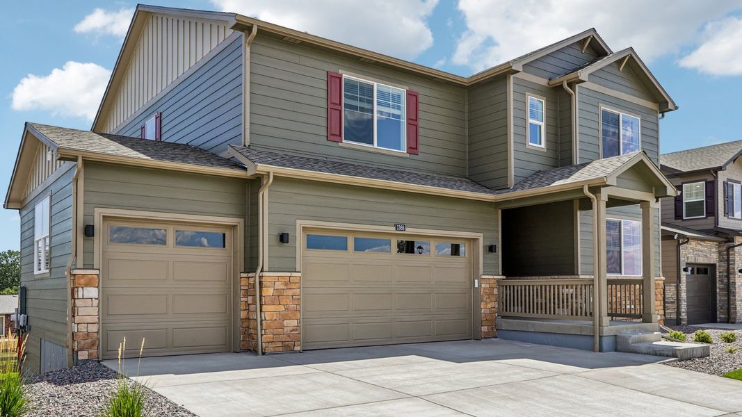 Front exterior of a new home in Vantage, Berthoud, CO, highlighting curb appeal (Image 2). Front exterior of a new home in Vantage, Berthoud, CO, highlighting curb appeal (Image 2).