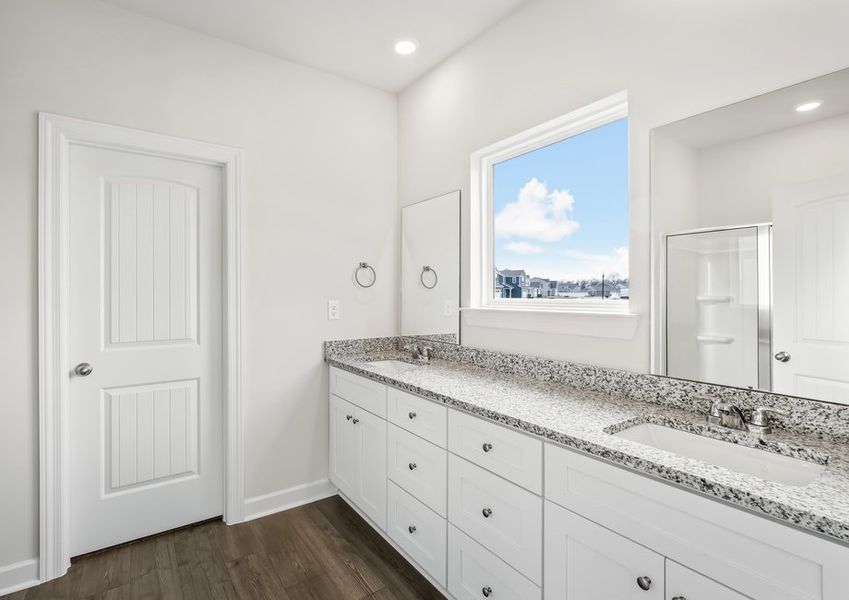 The master bathroom provides all the space you need to get ready in the morning The master bathroom provides all the space you need to get ready in the morning