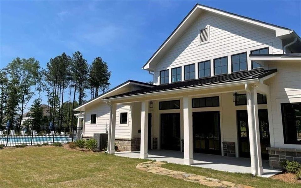 Exterior details and patio area of a home in Pinebrook at Hamilton Mill, Auburn (Image 24). Exterior details and patio area of a home in Pinebrook at Hamilton Mill, Auburn (Image 24).