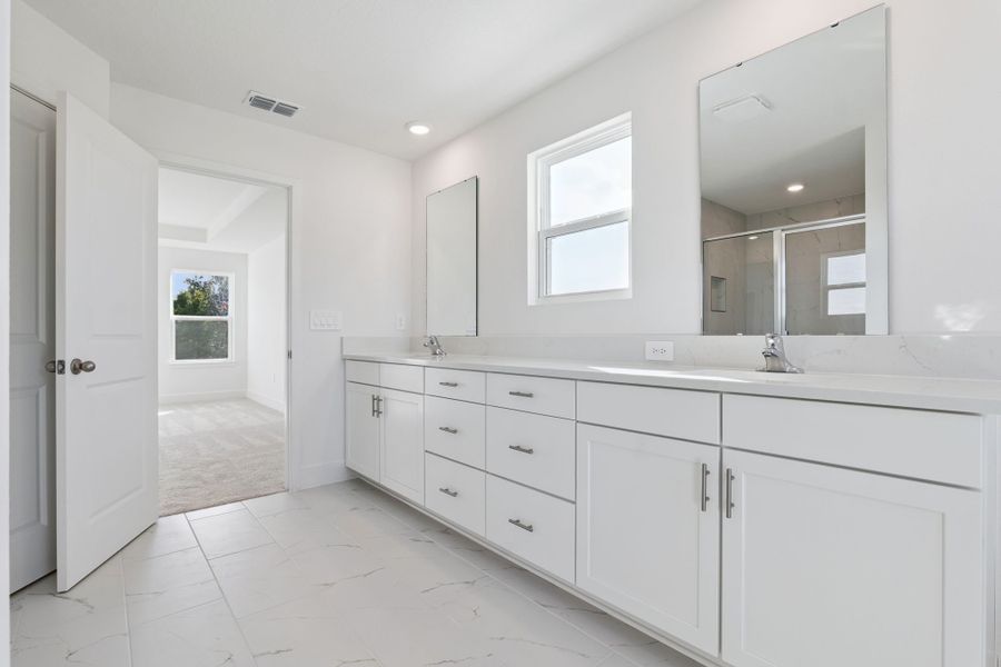 Representative furnished interior of a home built from the Clementine by Hartizen Homes in Eden Crest, Apopka (Image 10).