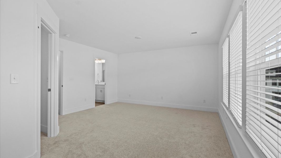 Spacious and serene primary suite with thoughtful design in a desirable DRB Homes community Spacious and serene primary suite with thoughtful design in a desirable DRB Homes community