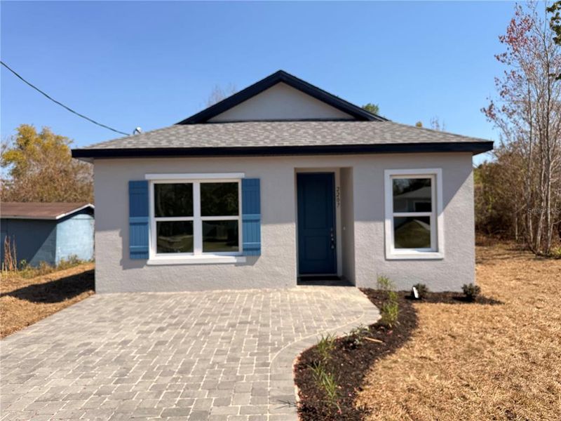 Front exterior of a new home in , Sanford, FL, highlighting curb appeal (Image 24).