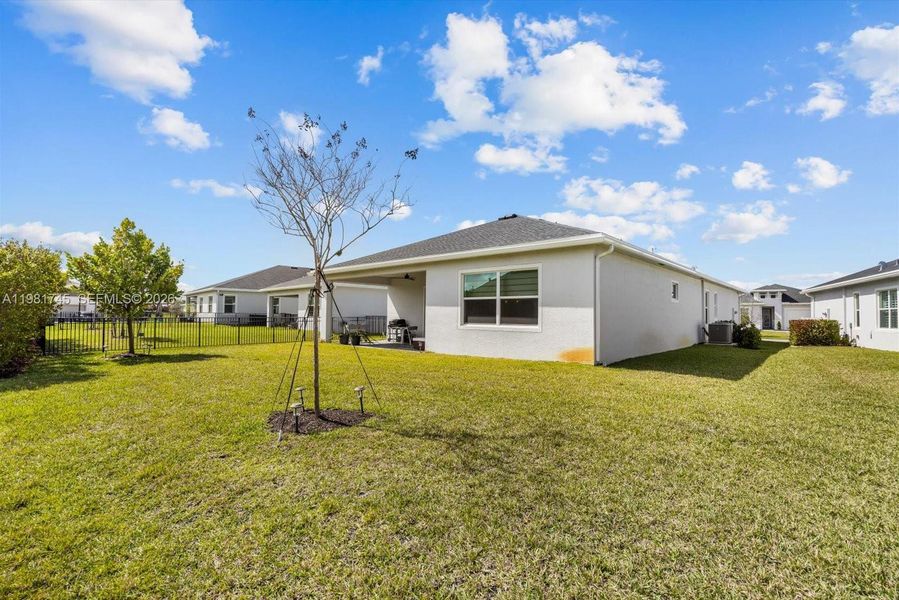 Exterior details and patio area of a home in Veranda Preserve, Port St. Lucie (Image 23).