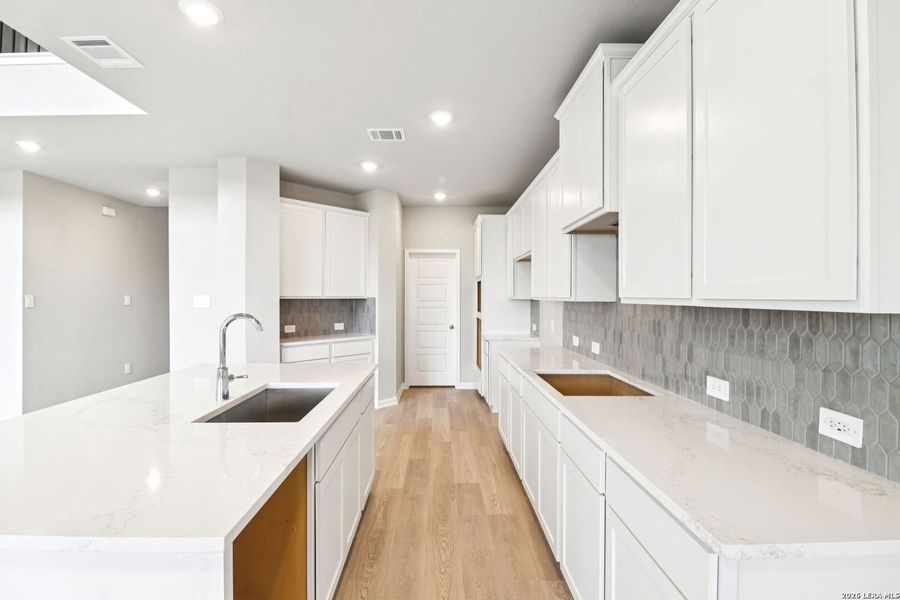 Furnished interior view inside a new home in Estancia Ranch - Classic Series, San Antonio (Image 17).