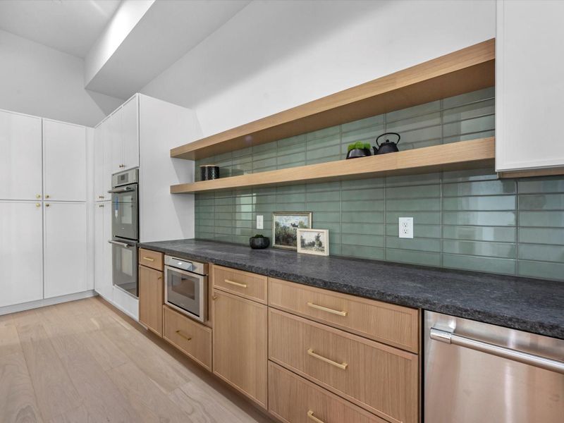Another look at your thoughtfully designed pantry with ample storage and functionality.