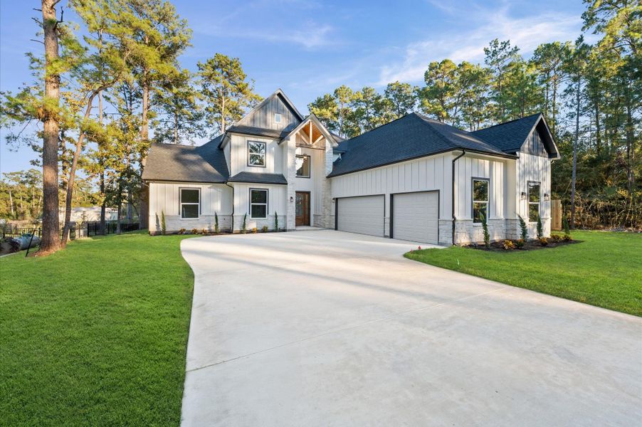 Front exterior of a new home in , Magnolia, TX, highlighting curb appeal (Image 24).