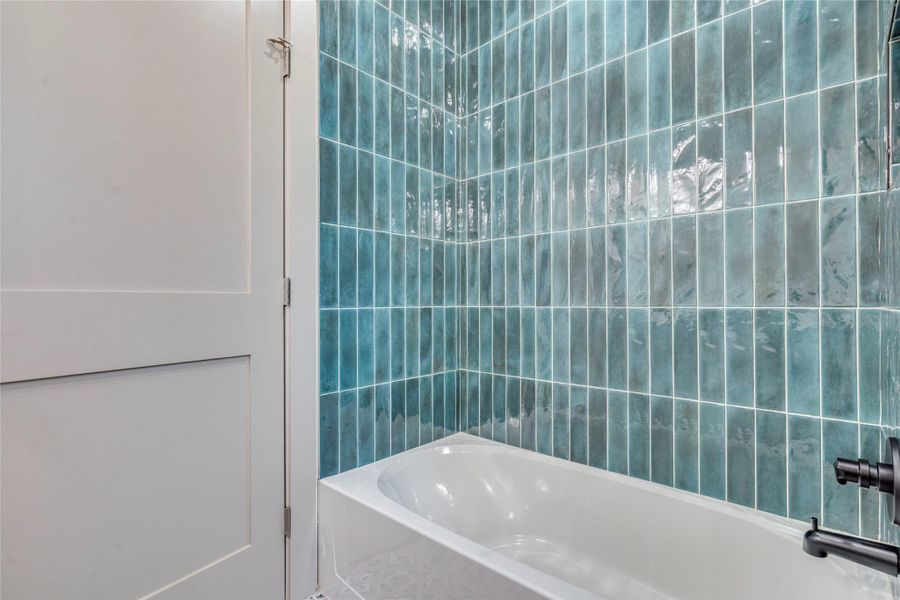 Full bathroom with bathing tub / shower combination