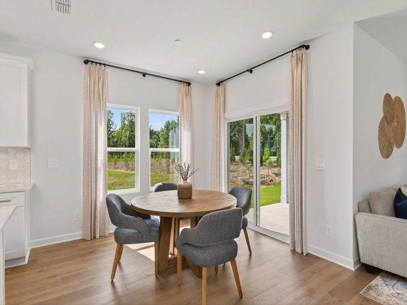 The dining area is perfect for a breakfast nook or classy dinner table.