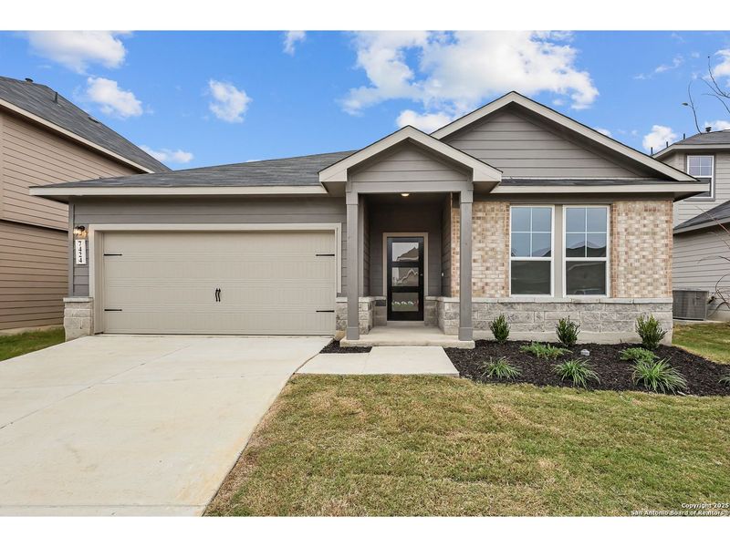 Front exterior of a new home in Horizon Pointe, San Antonio, TX, highlighting curb appeal (Image 1). Front exterior of a new home in Horizon Pointe, San Antonio, TX, highlighting curb appeal (Image 1).