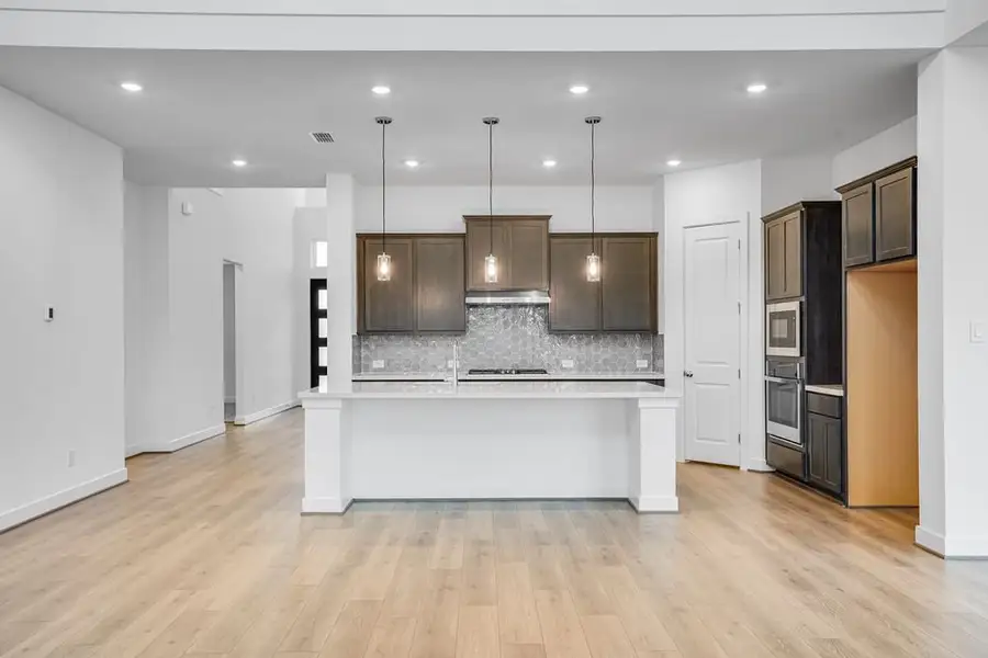 Furnished interior view inside a new home in Avalon at Cypress, Cypress (Image 9).