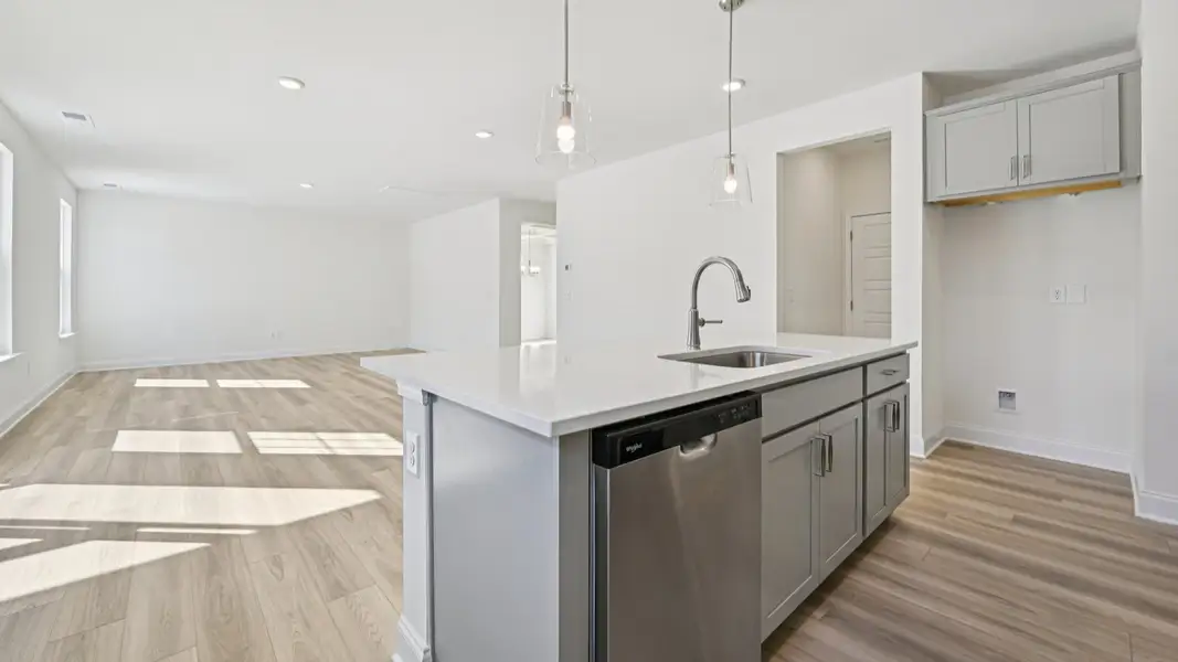 Wagener home plan spacious kitchen with island overlooking family room Wagener home plan spacious kitchen with island overlooking family room