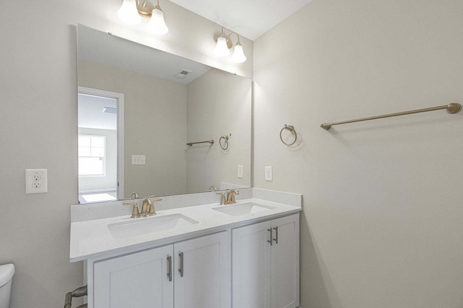 Representative furnished interior of a home built from the Magnolia by Caviness & Cates Communities in Bartlett Manor, Youngsville (Image 190).